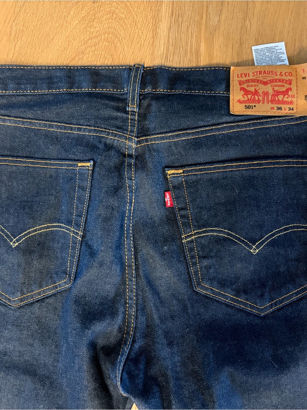 Levi's Men's Straight Jeans in Dark Blue Denim with Yellow Stitching